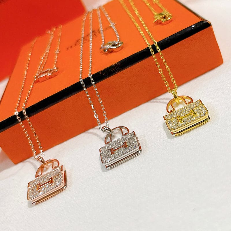 18K Hermes Amulettes Constance Pendant Necklace