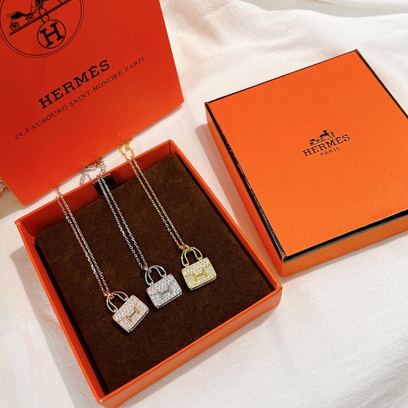 18K Hermes Amulettes Constance Pendant Necklace