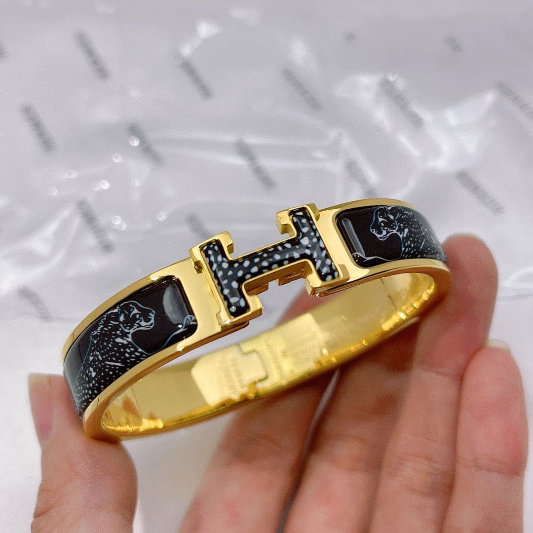 18K Hermes Guepards Clic Clac Bracelet