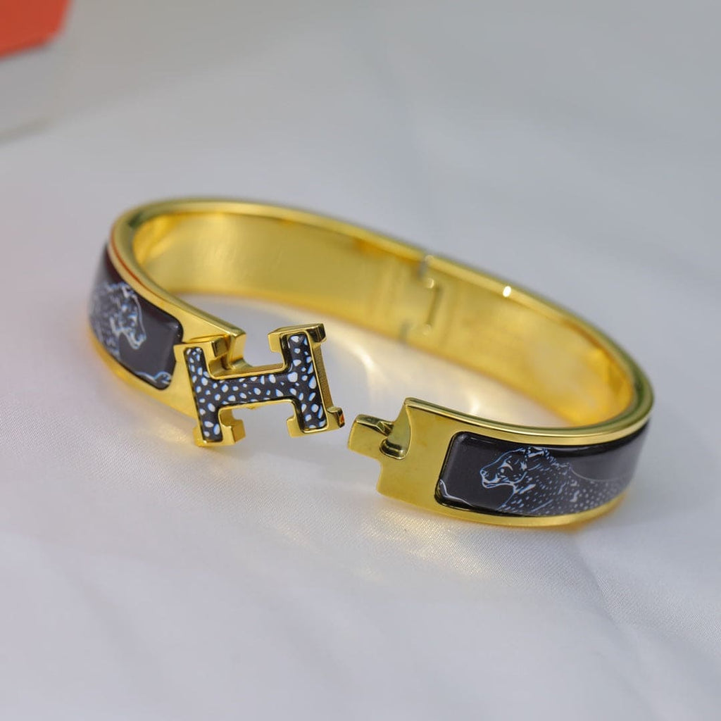 18K Hermes Guepards Clic Clac Bracelet