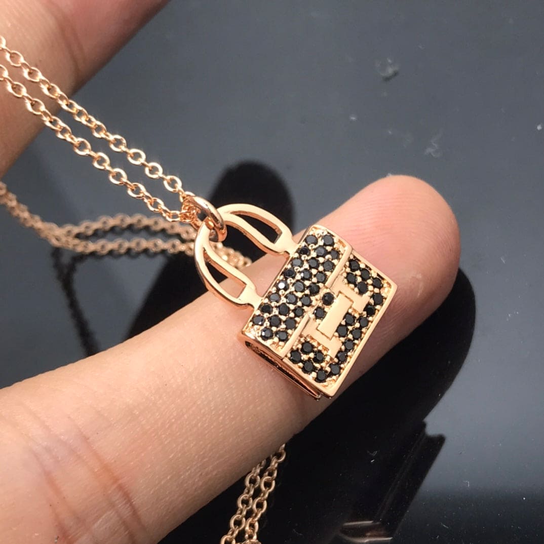 18K Hermes Amulettes Kelly Black Diamonds Necklace