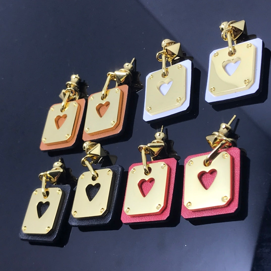 18K Hermes As De Celine Black Earrings