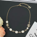 18K Chanel Black & White Camellia Necklace