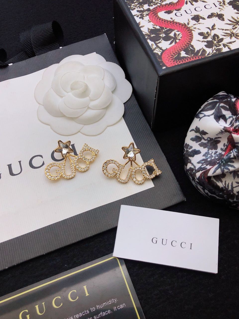 18K Gucci Double Script Star Earrings