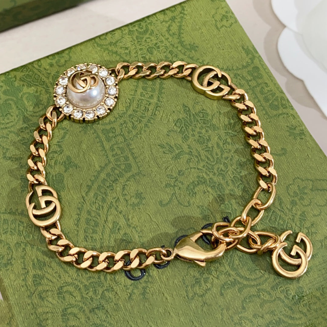 18K Gucci Double Interlocking Gucci Pearl Chain Bracelet