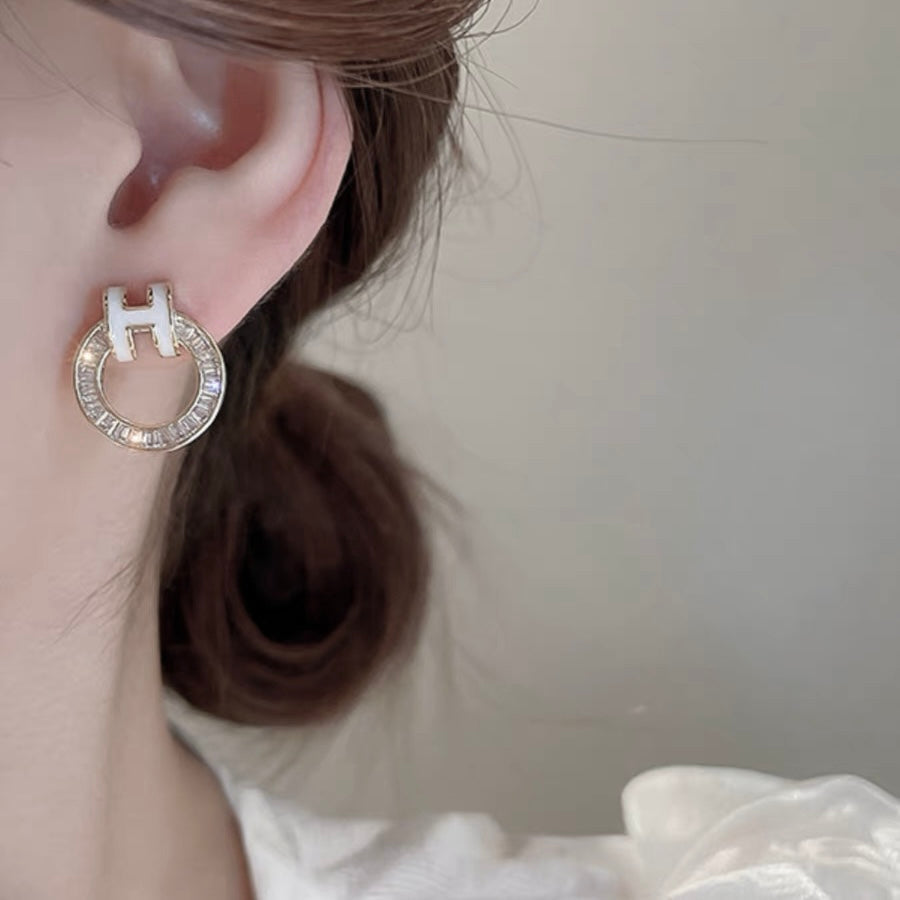 18K Hermes Clic Diamond Earrings