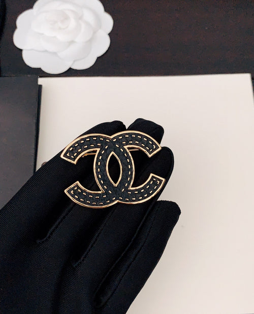 18K Chanel Black Brooch