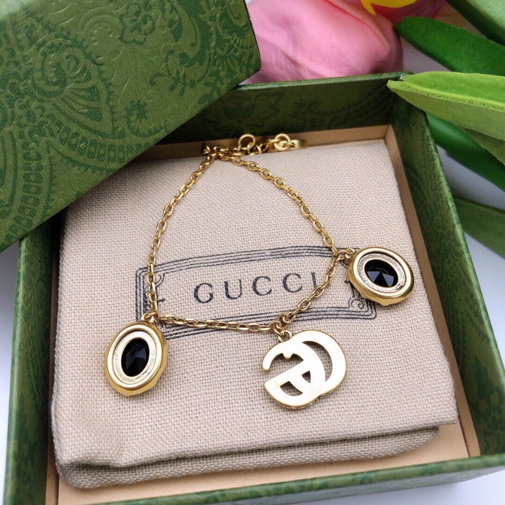 18K Gucci Double Black Stones Bracelet