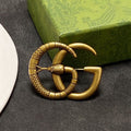 18K Gucci Double Snake Brooch